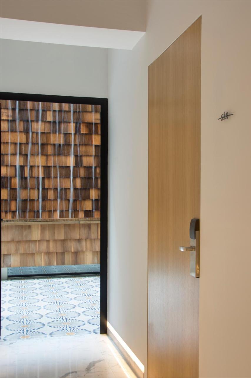 Готель Coco-Mat Athens Jumelle Екстер'єр фото A door with a water curtain
